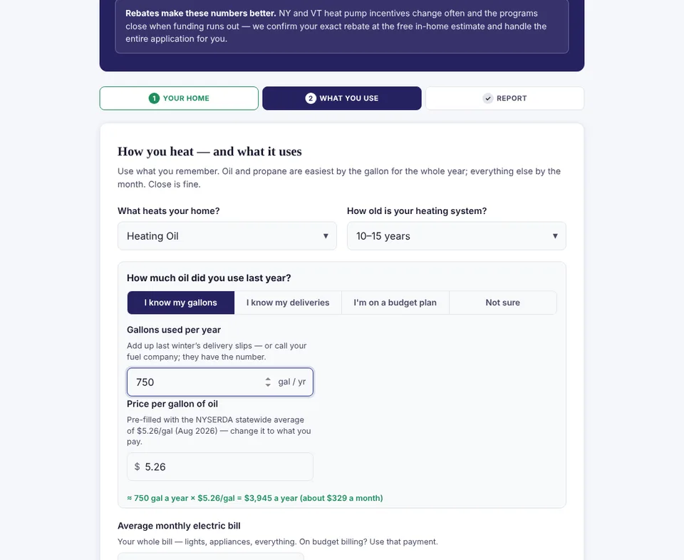 Second screen of the Heating Cost Calculator asking what heats the home, how old the heating system is, the average monthly electric bill and whether the home uses a wood stove, pellets, kerosene or space heaters, with a three-step progress bar for Your Home, What You Use and Report